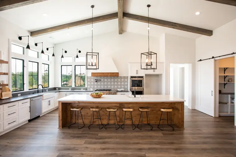 Kitchen and pantry with a sliding barn door