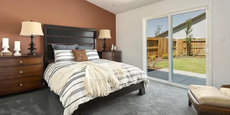 Primary bedroom with a sliding door to the backyard