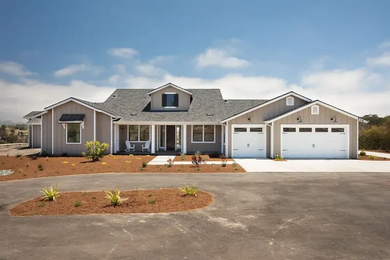 Wide single-story home with a multi-car garage